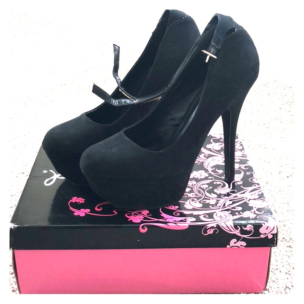 Black suede pumps